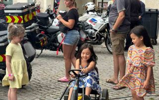 Children drive a car