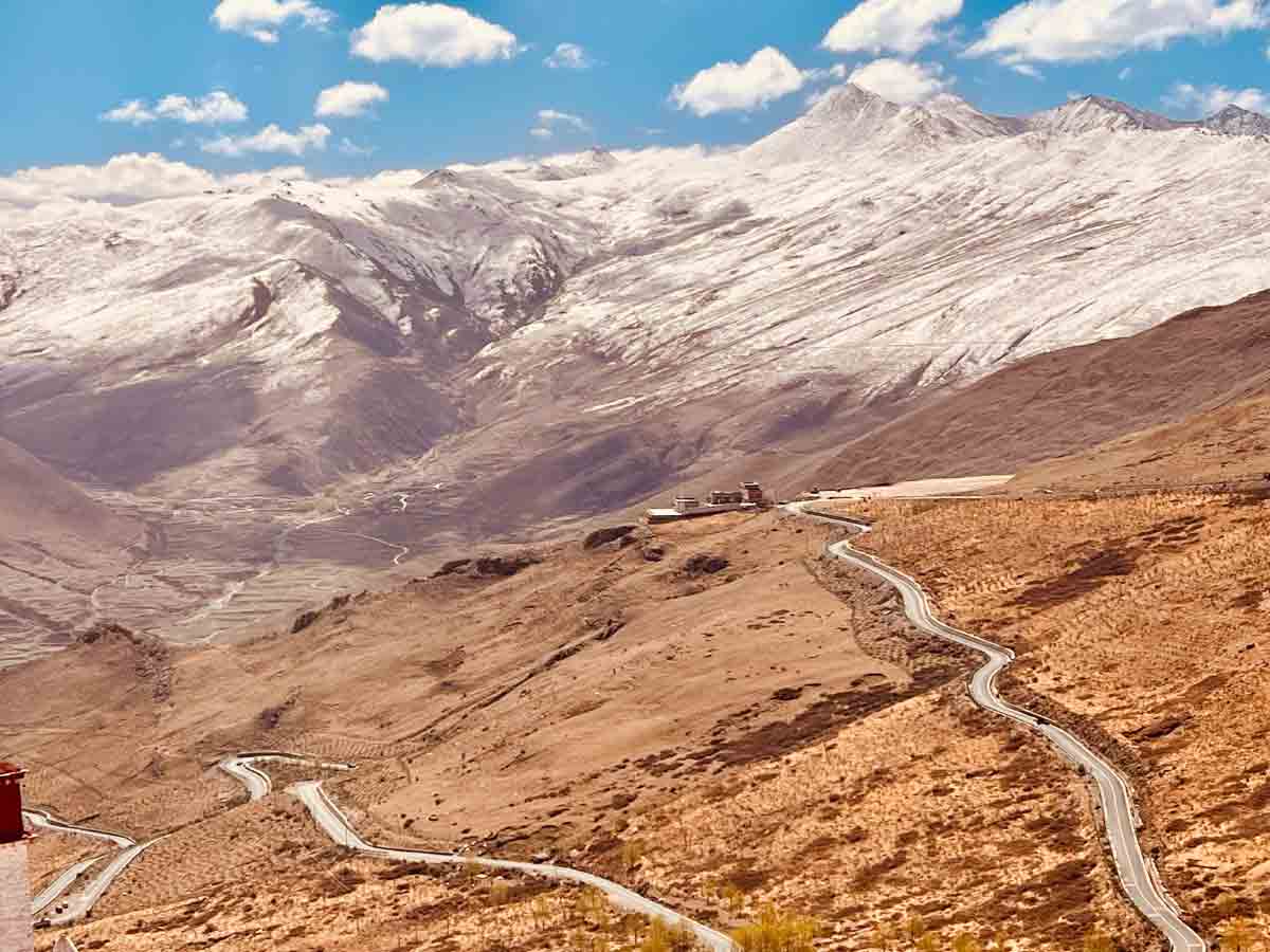 scenic road to mount everest base camp tibet A scenic mountain road winds across the Tibetan Plateau on the approach to Mount Everest Base Camp.
